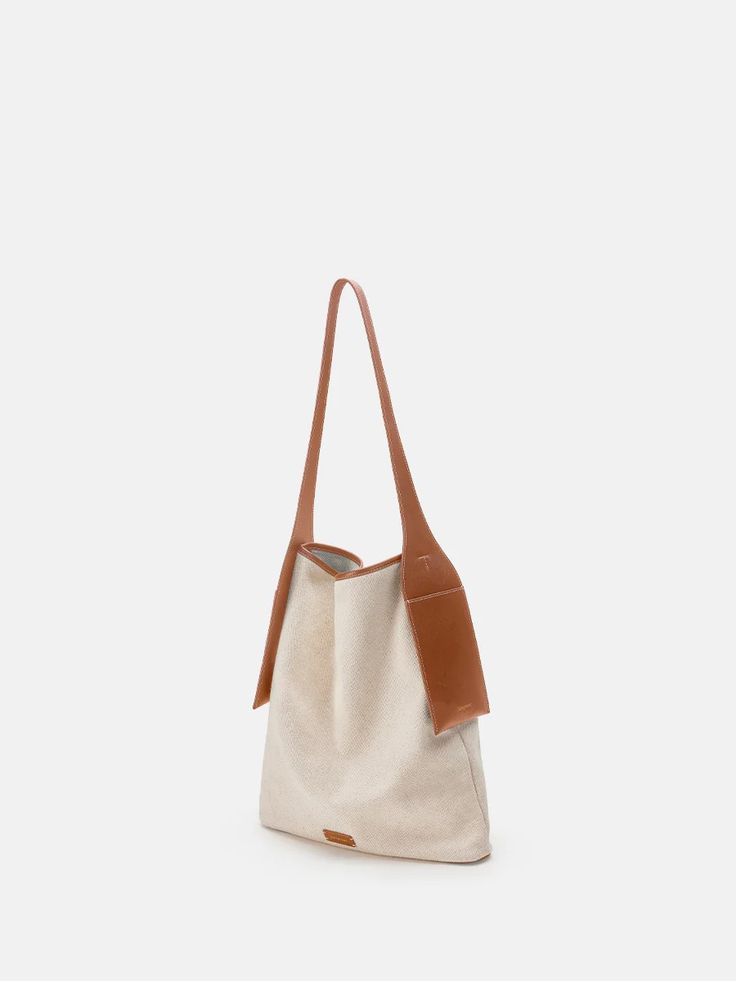 Canvas Tote Bag | Versatile Medium Tote for Everyday Use – Songmont Modern Brown Canvas Bag For On-the-go, Beige Canvas Bag For On-the-go, Beige Canvas Bag With Leather Handles For On-the-go, Beige Bag With Canvas Lining For On-the-go, Modern Large Capacity Canvas Bag For On-the-go, Practical Rectangular Canvas Satchel, Versatile Canvas Bucket Bag With Removable Pouch, Versatile Canvas Bucket Bag, Versatile Canvas Bucket Bag For On-the-go