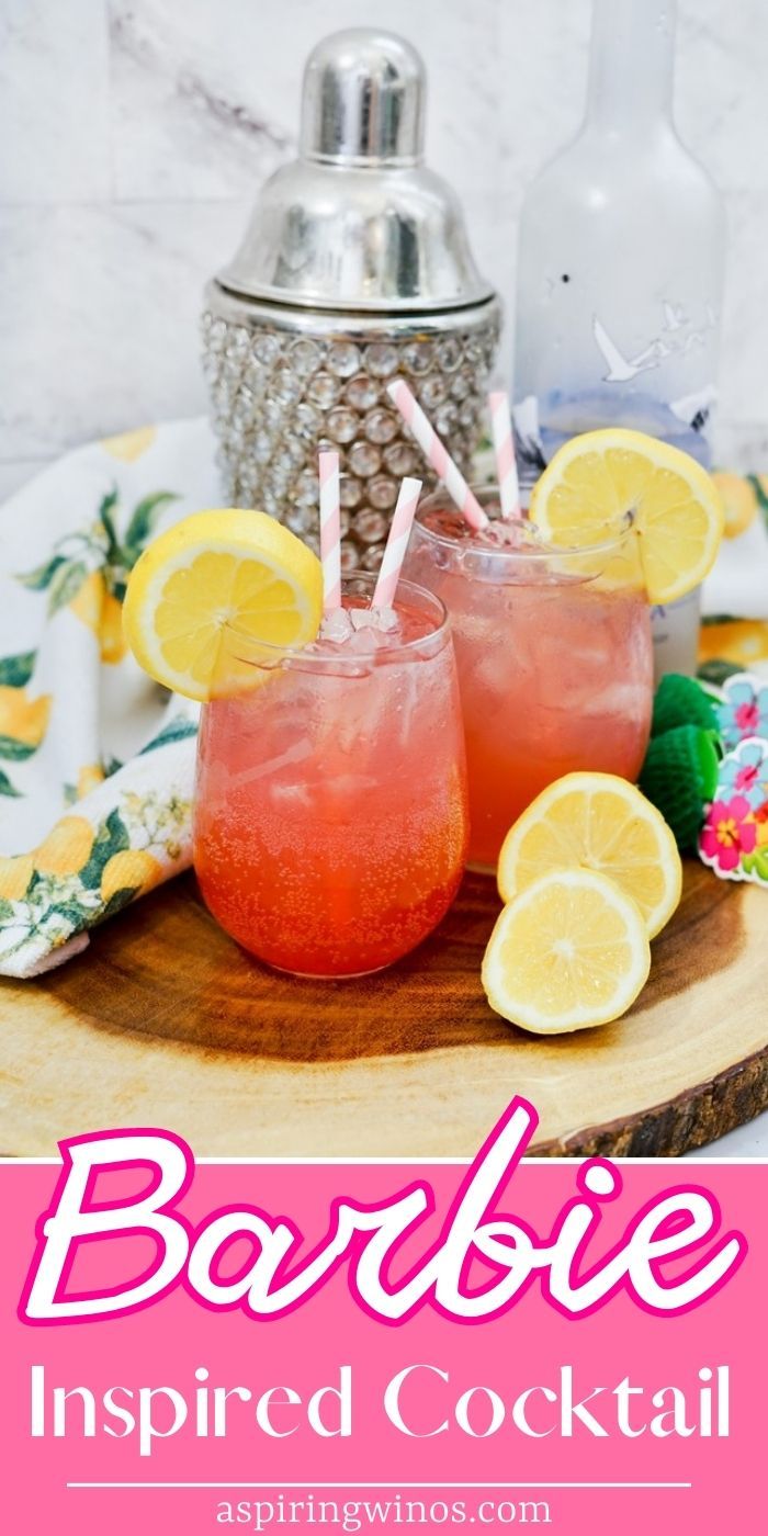 two glasses filled with pink lemonade on top of a wooden tray