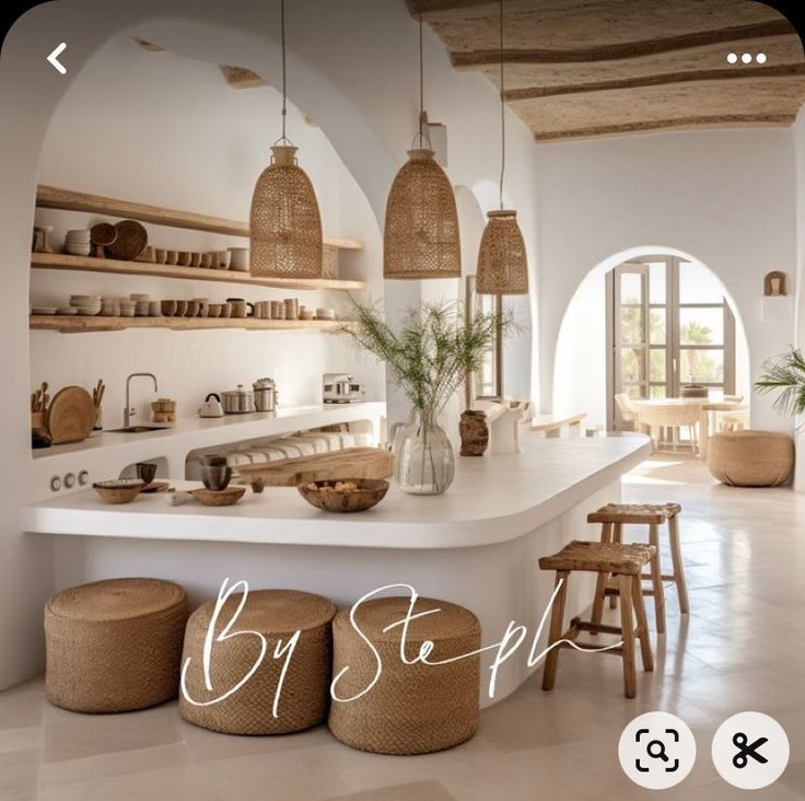 an image of a kitchen setting with baskets on the counter and stools in front of it