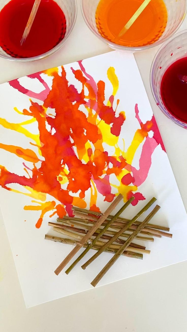 art project for kids using melted paint and sticks