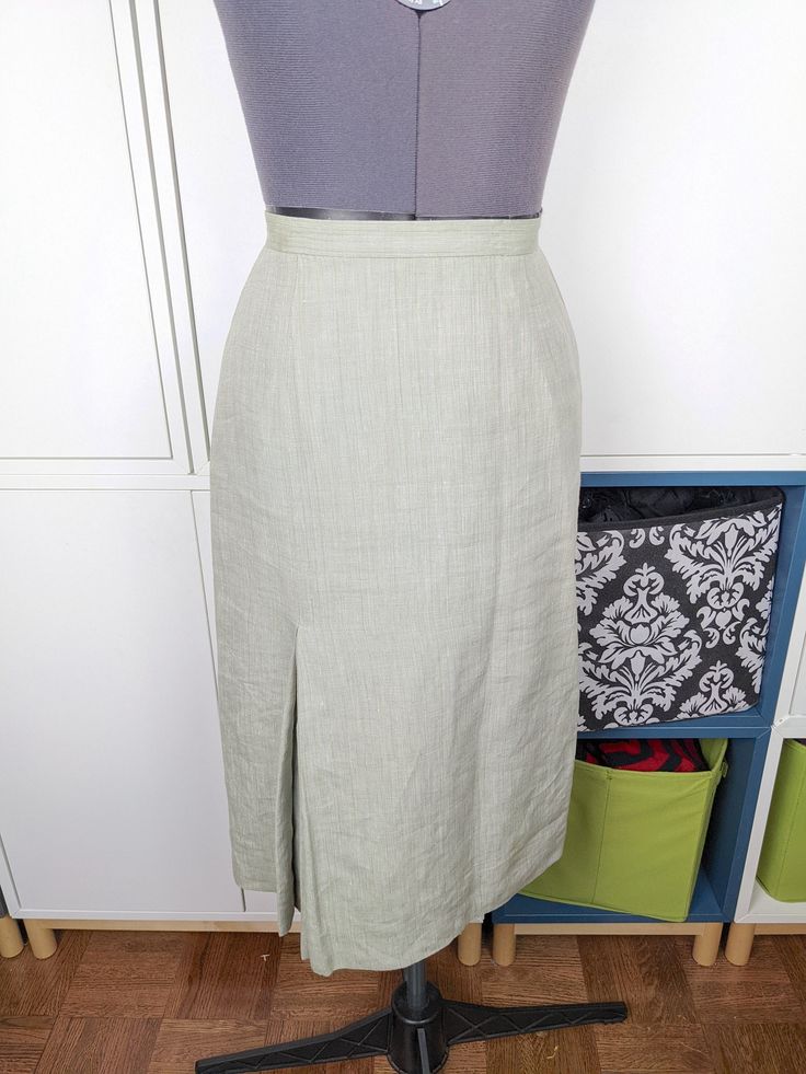 "Vintage 70's linen suiting skirt. Lovely shape, lightweight and breathable. Perfect for looking professional or dressed up in warm weather. Good condition, any flaws shown in pics. Matching blazer shown in pics is available in a separate listing. Marked a size 6, runs a little small. Best fits a size 4 but please check measurements below. Waist: 25\" Hip: 35\" Length: 28\"" Fitted Linen Skirt For Spring, Fitted Linen Knee-length Bottoms, Spring Fitted Linen Skirt, Fitted Knee-length Linen Bottoms, Fitted Linen Pencil Skirt, Formal Linen Skirt For Spring, Formal Spring Linen Skirt, Fitted Linen Formal Skirt, Formal Fitted Linen Skirt