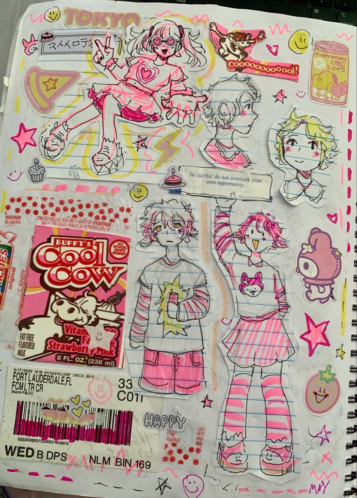 an open notebook with drawings and stickers on the pages, including girls in pajamas