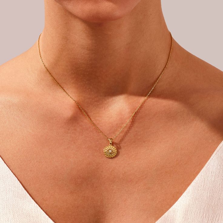 Ward off negativity and embrace style with our Evil Eye Coin Necklace in opulent 14k Solid Gold. Meticulously crafted, this captivating piece features a delicate gold chain and a unique coin pendant adorned with the protective symbol of the evil eye. FEATURES • Made to Order • Height: 11.50 mm • Width: 11.50 mm • Gold Kt: 14k Solid Gold, 18k Solid Gold • Available Gemstones: Diamond, Moissanite • Gemstone Cut: Round • Diamond Color - Clarity: G Color - SI1 Clarity • Number of Stones and Size: 1 Amulet Style Jewelry With Coin Pendant In Recycled Gold, Recycled Gold Amulet Jewelry With Coin Pendant, Amulet Style Coin Pendant Jewelry In Recycled Gold, Recycled Gold Coin Pendant Amulet Jewelry, Yellow Gold Plated Amulet Coin Necklace, Yellow Gold Plated Amulet Medallion Necklace, Amulet Style Yellow Gold-plated Medallion Necklace, Amulet Style Gold Plated Medallion Necklace In Yellow Gold, Amulet Style Gold Plated Medallion Necklace