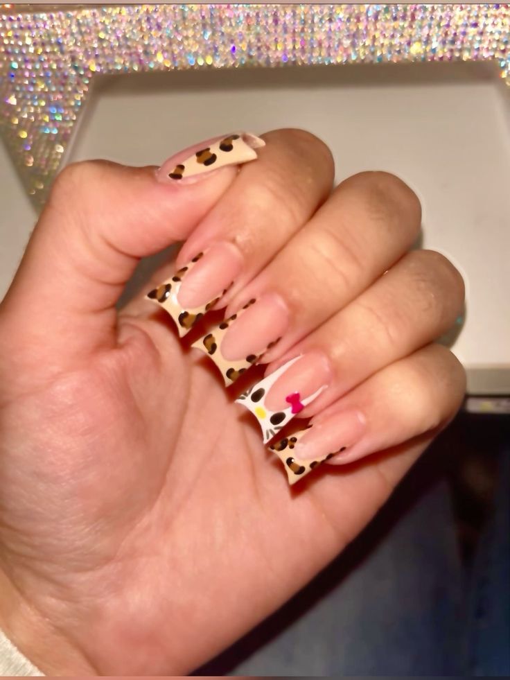 Stylish Nails French Tips, French Tip Cheetah Print Nails, Cheetah Print French Nails, French Tip Nails Cheetah, Hello Kitty Cheetah Print Nails, Cheetah Print Nail Ideas, Cheetah Hello Kitty Nails, French Tip Cheetah Nails, Nail Ideas Leopard Print