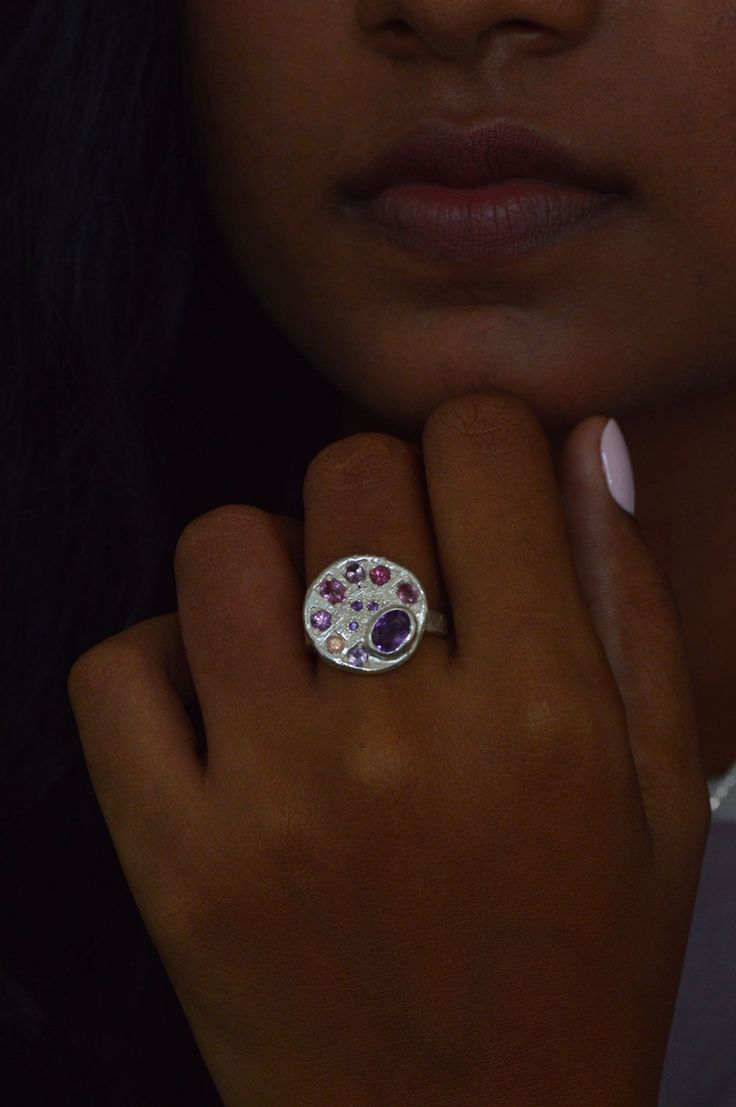 Contemporary design meets traditional craftsmanship with the one-of-a-kind Pallette sterling silver ring. Indulge in its poetic charm and pay tribute to the world art and design. Formed to evoke the colourful nature of an artist's pallette, this stunning ring showcases beautiful Amethyst, Sapphire, Spinel, Garnet and Tourmaline gemstones. Rich in texture and organic in design, is designed to express the unique and imaginative soul of its wearer. Details925 Sterling SilverHandcrafted in our studi Sterling Silver Multi-stone Ruby Ring, Sterling Silver Multi-stone Round Ruby Ring, Luxury Multicolor Sterling Silver Rings, Multi-stone Amethyst Ring, Unique Multi-stone Amethyst Ring In Sterling Silver, Unique Multi-stone White Gold Rings, One Of A Kind Sterling Silver Luxury Rings, One Of A Kind Luxury Sterling Silver Rings, Luxury One-of-a-kind Sterling Silver Rings