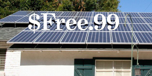 a solar panel with the word free 99 written on it in front of a house