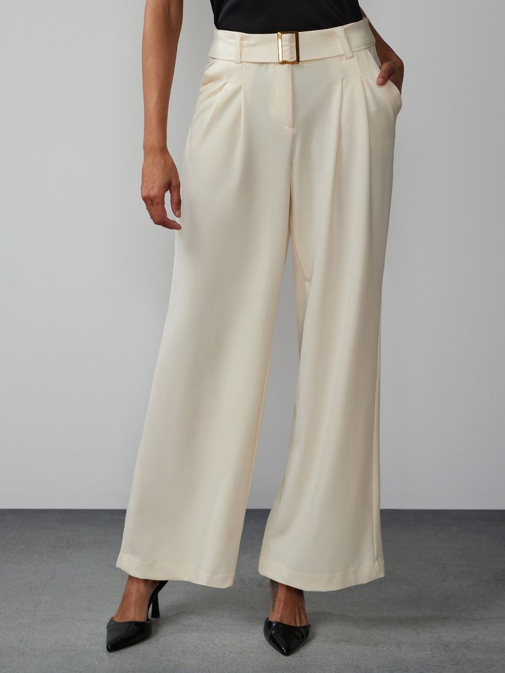 Achieve a timeless and versatile style that suits any occasion in this chic pair of pants. Crafted with meticulous attention to detail, these pants feature a high rise waist, elegant pleats, and a flattering wide leg silhouette that exudes sophistication. Pair them with a tucked-in blouse and heels for a polished office look. Elegant Formal Wide-leg Culottes, Elegant Wide-leg Formal Culottes, Timeless Semi-formal Wide Leg Bottoms, Modern Wide Leg Pants For Summer Formal Events, Solid Wide-leg Bottoms With Pleated Waist, Wide Leg Bottoms With Pleated Waist, Elegant Summer Wide-leg Culottes, Chic Formal Wide-leg Culottes, Modern Formal Wide Leg Pants For Summer