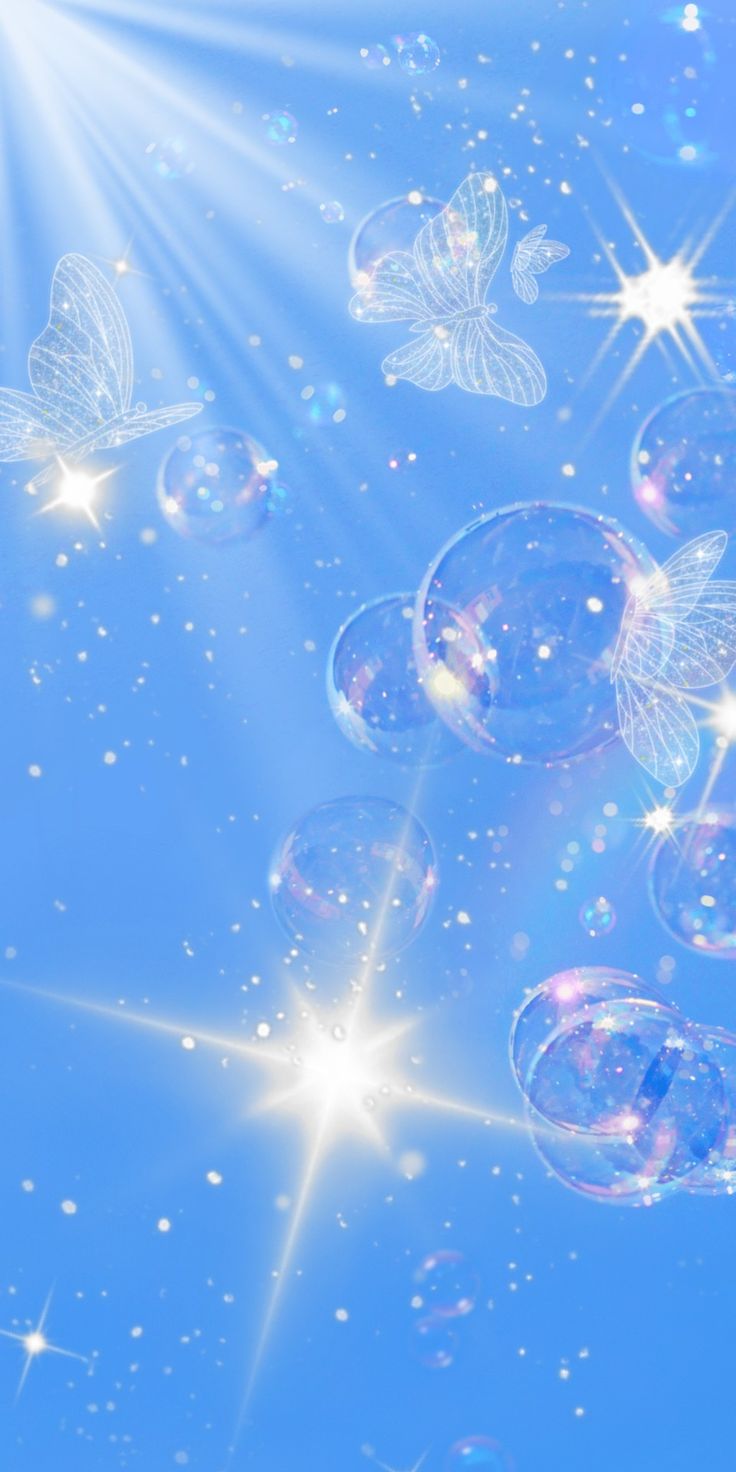 soap bubbles floating in the air with sunbeams and stars around them on a blue background