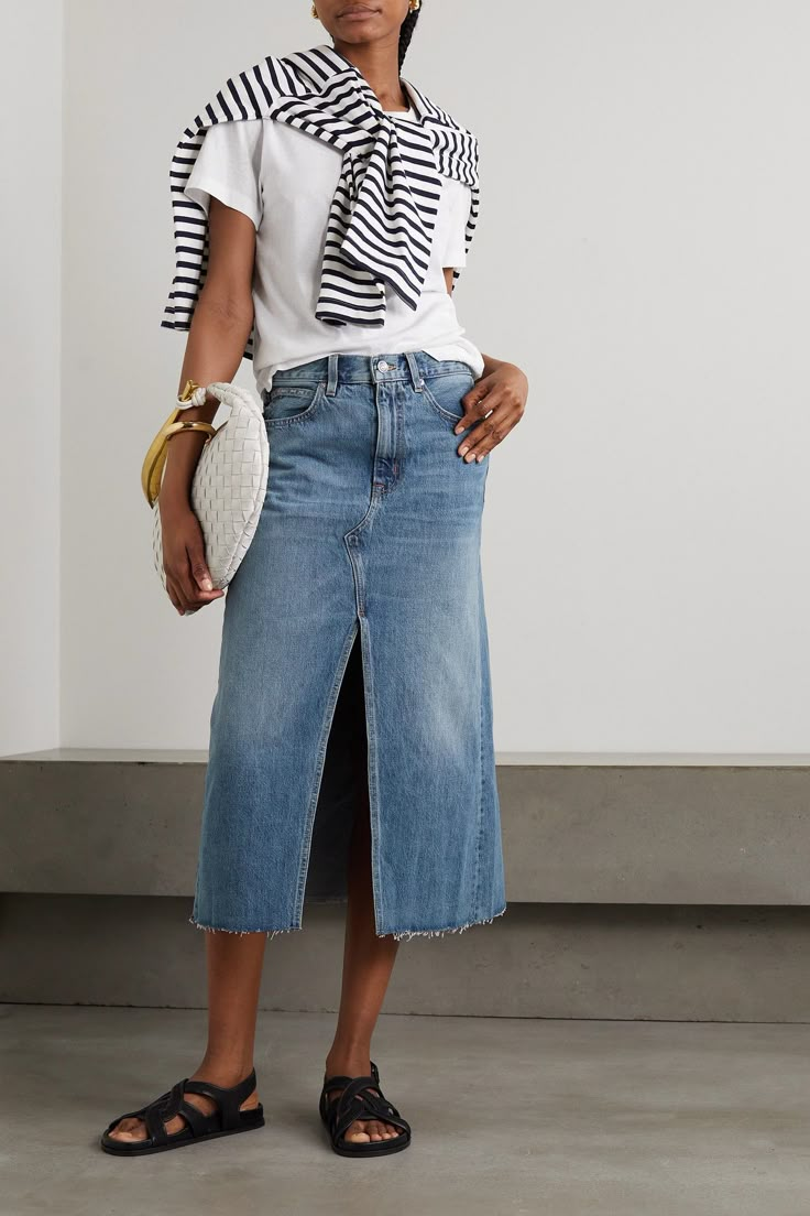 <i>PORTER</i> declares the denim skirt one of the most covetable items for Spring '23. Made in LA using organic denim, this one by SLVRLKE has a '90s-inspired, midi length with an open front and frayed hem. Spot clean it to minimize washing, and use a cold cycle when needed.<br><br>This product was Locally Made using Considered Materials. Find out more about NET SUSTAIN <a href="https://www.net-a-porter.com/en-gb/campaigns/net-sustain">here.</a& Denim Skirt Outfit Ideas, Denim Skirt Outfit Summer, Looks Total Jeans, Denim Midi Skirt Outfit, Long Denim Skirt Outfit, Denim Skirt Outfit, How To Have Style, Spring Skirt Outfits, Skirt Outfit Ideas