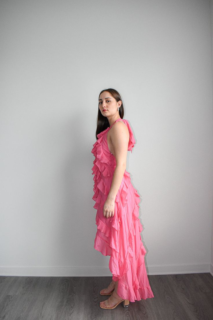 Elevate your style with our Pink Asymmetrical Maxi Dress. This stunning dress features a solid halter neckline and asymmetrical ruffle detail, adding a touch of elegance and uniqueness to your look. Crafted from a blend of 75% Rayon and 25% Polyester, with a 100% Rayon lining, it provides maximum comfort and breathability. Perfect for any occasion, this beautiful pink dress is designed to make you stand out in any crowd. Whether you're attending a special event or a casual gathering, this Pink A Asymmetrical Maxi Dress, Halter Maxi, Halter Maxi Dresses, Pink Maxi Dress, Ruffled Maxi Dress, Maxi Dress Blue, Halter Neckline, Asymmetrical Dress, Stunning Dresses