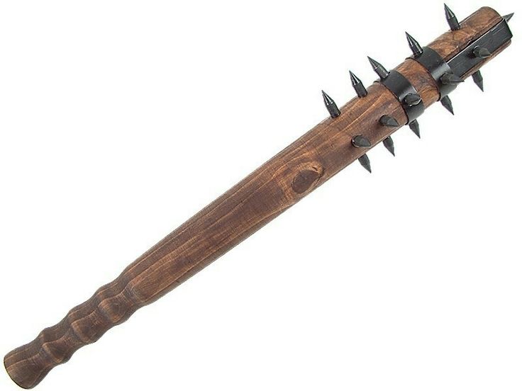 a wooden handle with spikes on it