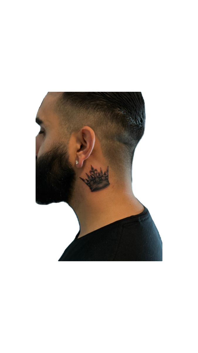 a man with a crown tattoo on his neck