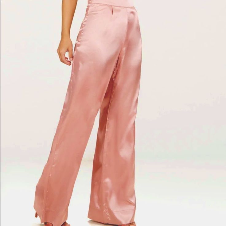 New With Tags Blush Nastygal Satin Split Leg Wide Leg Pants, Size Small Never Been Worn With Tags Size Small But Can Fit Up To A Large 36 Inch Inseam 11 Inch Rise Elastic Waist 28 29 Inches Across Hips Ships From A Smoke Free And Pet Free Home. Please Feel Free To Ask Any Questions. Always Accepting Offers. Spring Satin Straight Leg Pants, Chic Pink Satin Bottoms, Spring Pink Satin Bottoms, Elegant Pink Satin Bottoms, Fitted Satin Bottoms With Straight Leg, Fitted Satin Straight Leg Bottoms, Summer Satin Straight Leg Bottoms, Fitted Satin Pants For Summer, Fitted Satin Summer Pants