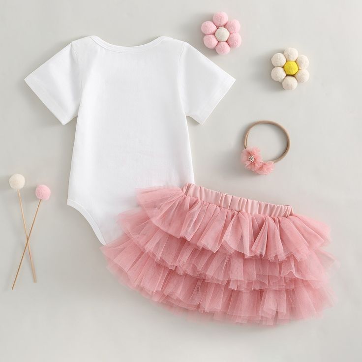 Celebrate your daughter's first year of bringing smiles to your family with the perfect outfit for memories that will last a lifetime in this gorgeous pink tutu ensemble exudes sophistication, elegance, and classiness. Elegant Pink Tutu Dress For First Birthday, Pink Sets For First Birthday In Spring, Pink First Birthday Sets For Spring, First Birthday Fitted Sets With Ruffles, Elegant Fitted Tutu Dress For First Birthday, Fitted Pink Tutu Dress For Baptism, Pink Fitted Tutu Dress For Baptism, Pink Fitted Sets For Baptism, Fitted Pink Baptism Set