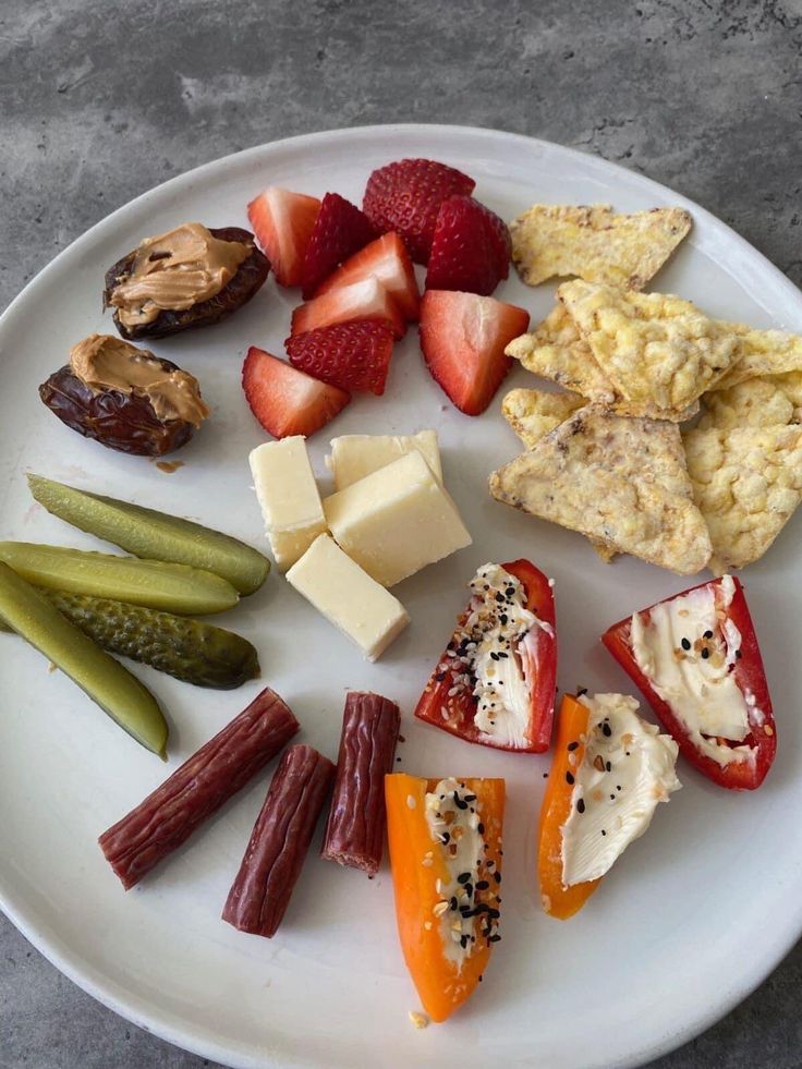 a white plate topped with different types of food