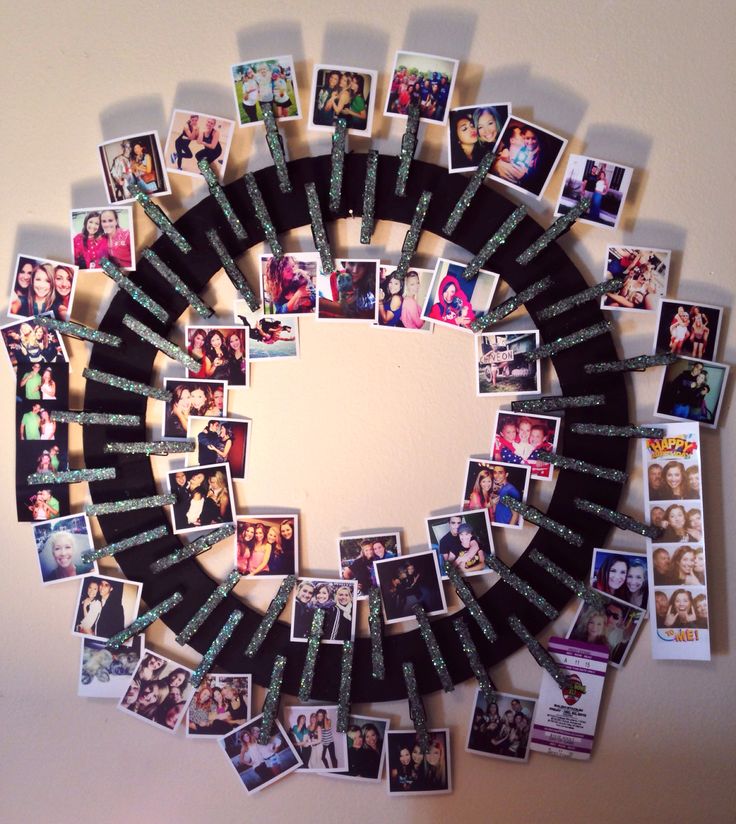 a circular mirror with many pictures on it