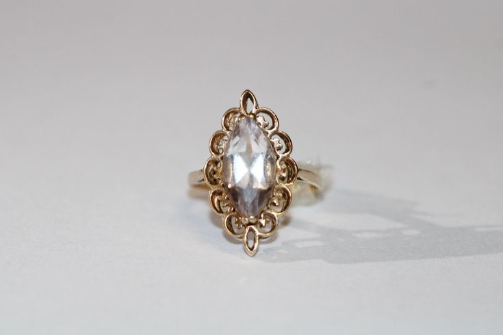 SKU: 0195 A beautiful fancy ring set in 9ct yellow gold. This pretty ring would be perfect for any and every occasion. Size: UK: M 1/2 American: 6 1/2 Continental: 12 1/2 This is a vintage item and such has wear. There may be some superficial scratches, otherwise the item is good condition. This item comes beautifully boxed in our own packaging. Processing time for orders is 1-3 business days. Fancy Rings, Pretty Rings, Rings Statement, Ring Sets, Statement Rings, Vintage Items, Jewelry Rings, Yellow Gold, Yellow