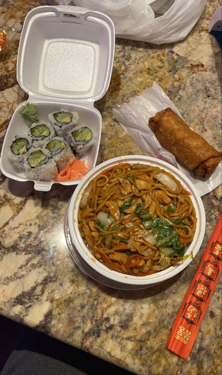 Chinese takeout of sushi, lo mein and an egg roll on a kitchen counter Take Out Aesthetic Food, Asian Takeout Aesthetic, Lo Mein Aesthetic, Egg Rolls Aesthetic, Chinese Food Aethstetic Take Out, Sushi Takeout Aesthetic, Chinese Noodles Aesthetic, Egg Roll Aesthetic, Chinese Dinner Aesthetic