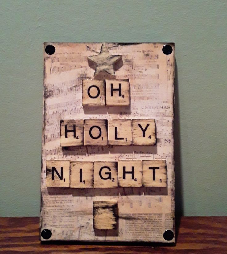 a wooden sign that says oh, holly night