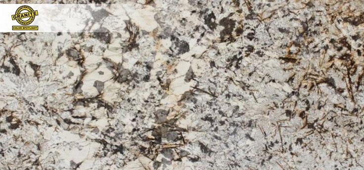 a marble counter top with brown and white colors