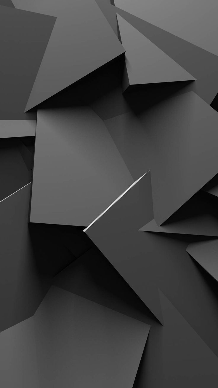 an abstract black and white photo with lots of small triangles on it's surface