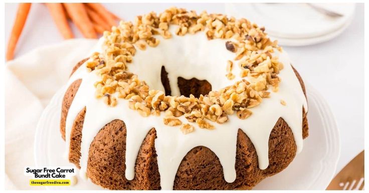 a bundt cake with white icing and nuts on top sitting on a plate