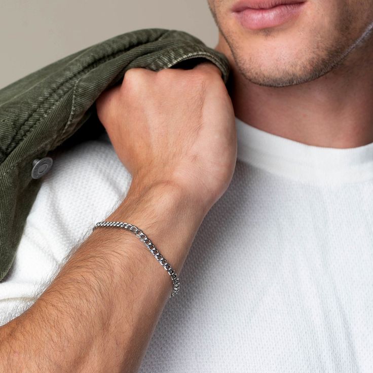 Roll up your sleeves, because our most requested piece is finally here. Our Cuban Silver Link 5mm bracelet makes a statement by pairing this with one with our chains or layer with our other bracelets. Classic Bracelets For Everyday And Father's Day, Classic Everyday Bracelets For Father's Day, Minimalist Cuban Link Bracelet For Everyday, Minimalist Cuban Link Bracelet, Everyday Minimalist Cuban Link Bracelet, Minimalist Silver Wristband For Everyday, Everyday Silver Minimalist Wristband, Modern Adjustable Cuban Link Bracelet For Everyday Wear, Modern Adjustable Cuban Link Bracelet For Everyday