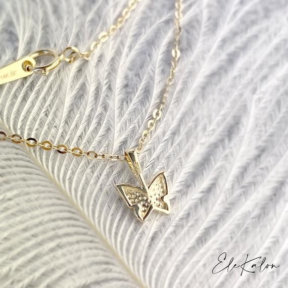 One Piece of Dancing Butterfly Charm Pendant made in Solid 14K goldSold as Pendant only or Pendant+16.5” 1mm cable chain 💍 Pendant Detail✔️Metal Purity: 14K Solid Gold✔️Color: Yellow Gold/Rose Gold✔️Stamp: 14K✔️Size:  7x5.5mm 💍 Chain Detail✔️Metal Purity: 14K Solid Gold✔️Color: Yellow Gold/Rose Gold✔️Stamp: 14K✔️Width: 1mmWanna matching stud earrings⬇️https://etsy.me/2AOZykOWant to check out more pendants⬇️https://etsy.me/2MyjnPw🛠️Customisation options are available📌Design can be personalise Dainty Yellow Gold Butterfly Pendant Necklace, Yellow Gold Butterfly Charm Jewelry For Everyday, Yellow Gold Jewelry With Butterfly Charm For Everyday, Everyday Yellow Gold Jewelry With Butterfly Charm, Dainty Gold-plated Yellow Gold Butterfly Necklace, Dainty 14k Gold Butterfly Jewelry, Dainty 14k Yellow Gold Butterfly Necklace, Sterling Silver Butterfly Charm Necklace, Yellow Gold Butterfly Charm Pendant Necklace