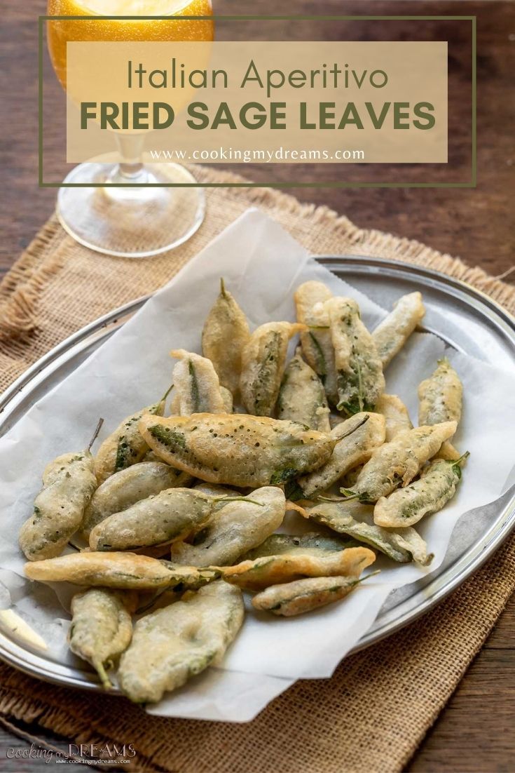 fried sage leaves on a white plate with a glass of beer in the background and text overlay that reads italian appetivo fried sage leaves