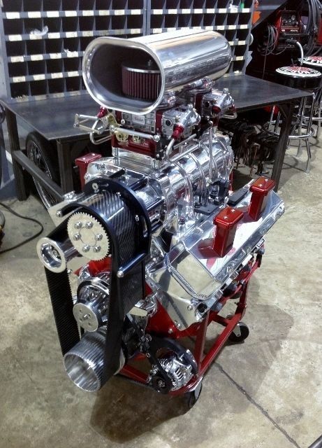 an engine is shown on display in a garage