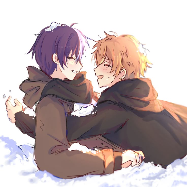 two people sitting in the snow hugging each other