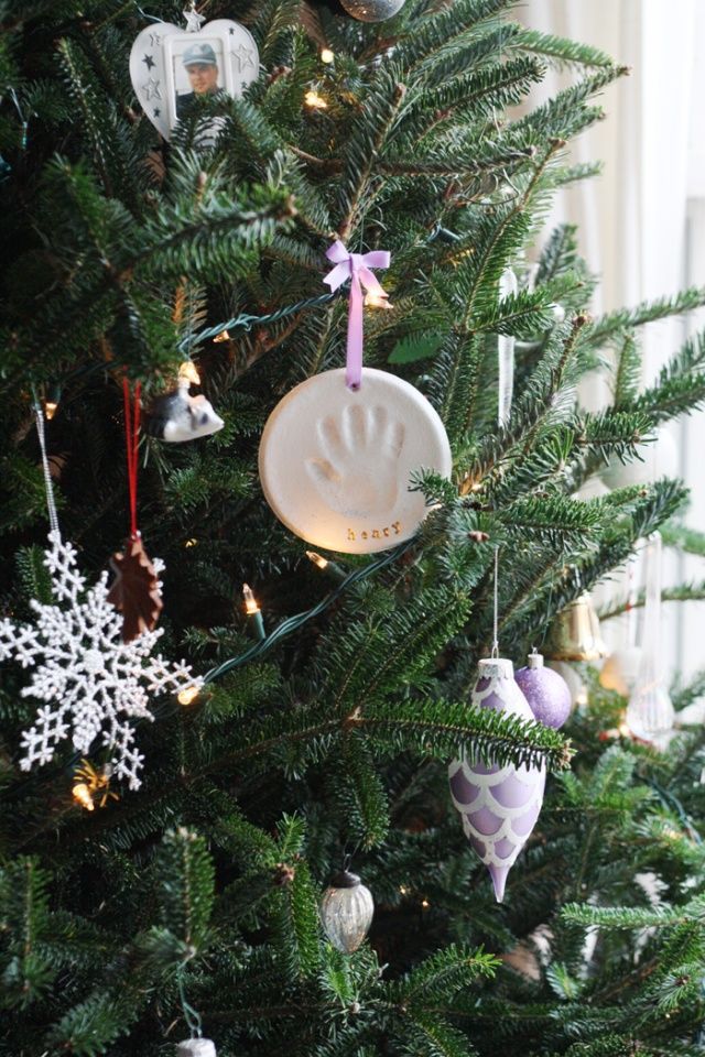 a christmas tree with ornaments hanging from it