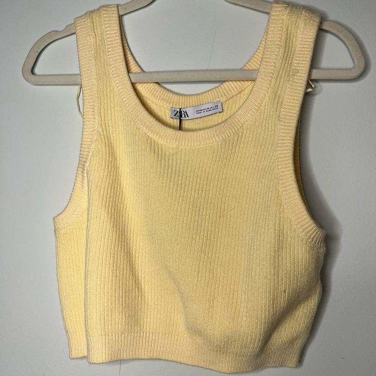 Yellow Knit Tank Top Ntw Zara Great Summer Piece Affordable Green Zara Crop Top, Textured Knit Tank Top For Summer, Knit Pointelle Crew Neck Crop Top, Zara Ribbed Knit Top, Chic Zara Soft Knit Tops, Sleeveless Textured Knit Crop Top, Casual Yellow Seamless Tops, Casual Pointelle Knit Tank Tops, Textured Knit Sleeveless Crop Top