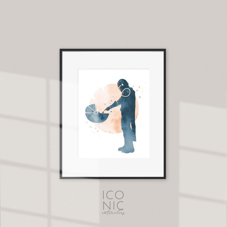 a man is holding a basketball ball in his hand while standing next to a wall