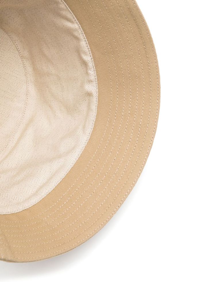 sand beige cotton/canvas flat crown logo patch to the front dropped narrow brim full lining This piece comes complete with a protective dust bag. This item is in size 58 and the color is Brown Brown Cotton Flat Brim Bucket Hat, Beige Canvas Hat With Short Brim, Beige Wide Brim Canvas Hat, Beige Cotton Sun Hat For Everyday, Everyday Beige Cotton Sun Hat, Beige Canvas Bucket Hat For Summer, Beige Cotton Bucket Hat With Short Brim, Beige Canvas Bucket Hat, Everyday Curved Brim Canvas Hat