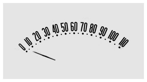 a speedometer with the words slow written in black and white on top of it