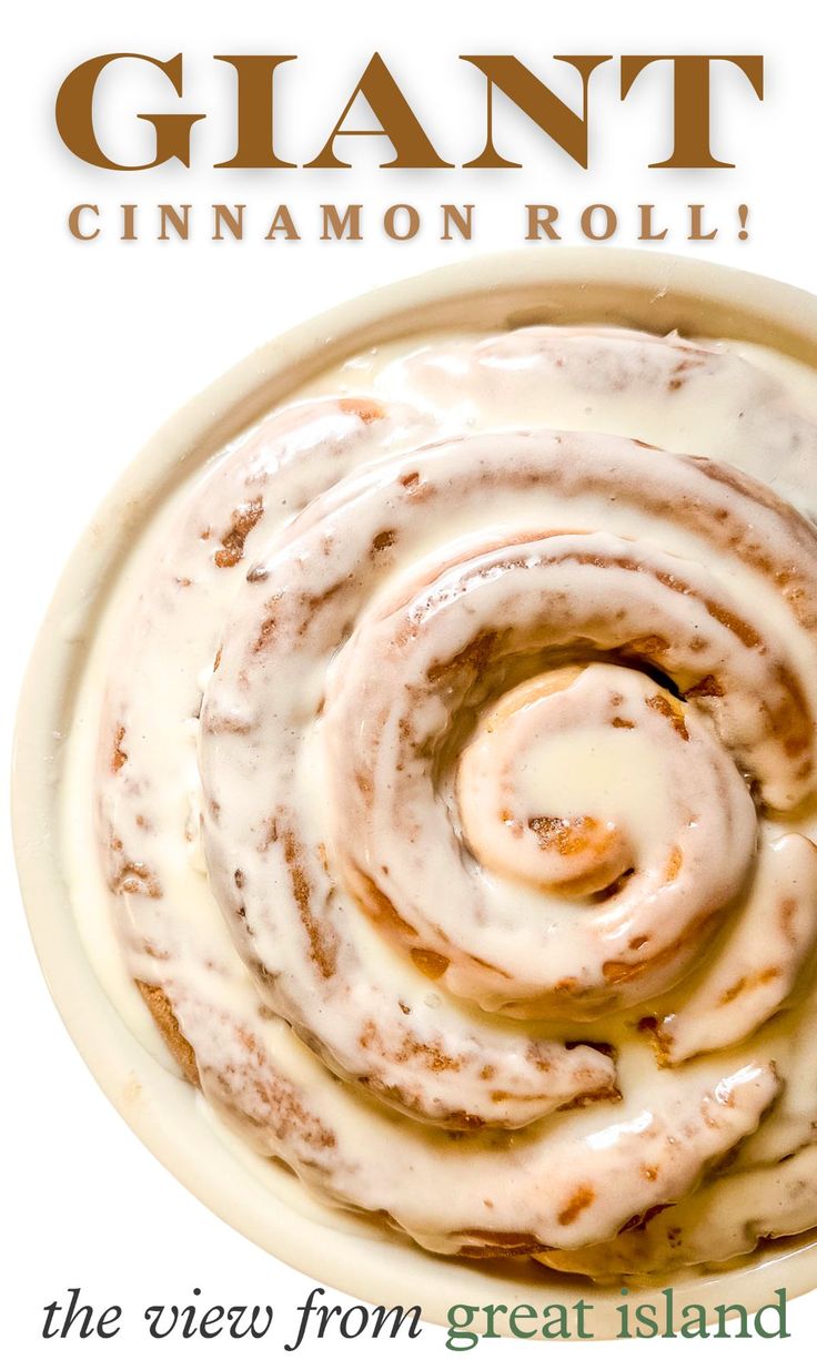 a plate with cinnamon rolls on it and the words giant cinnamon roll written in white