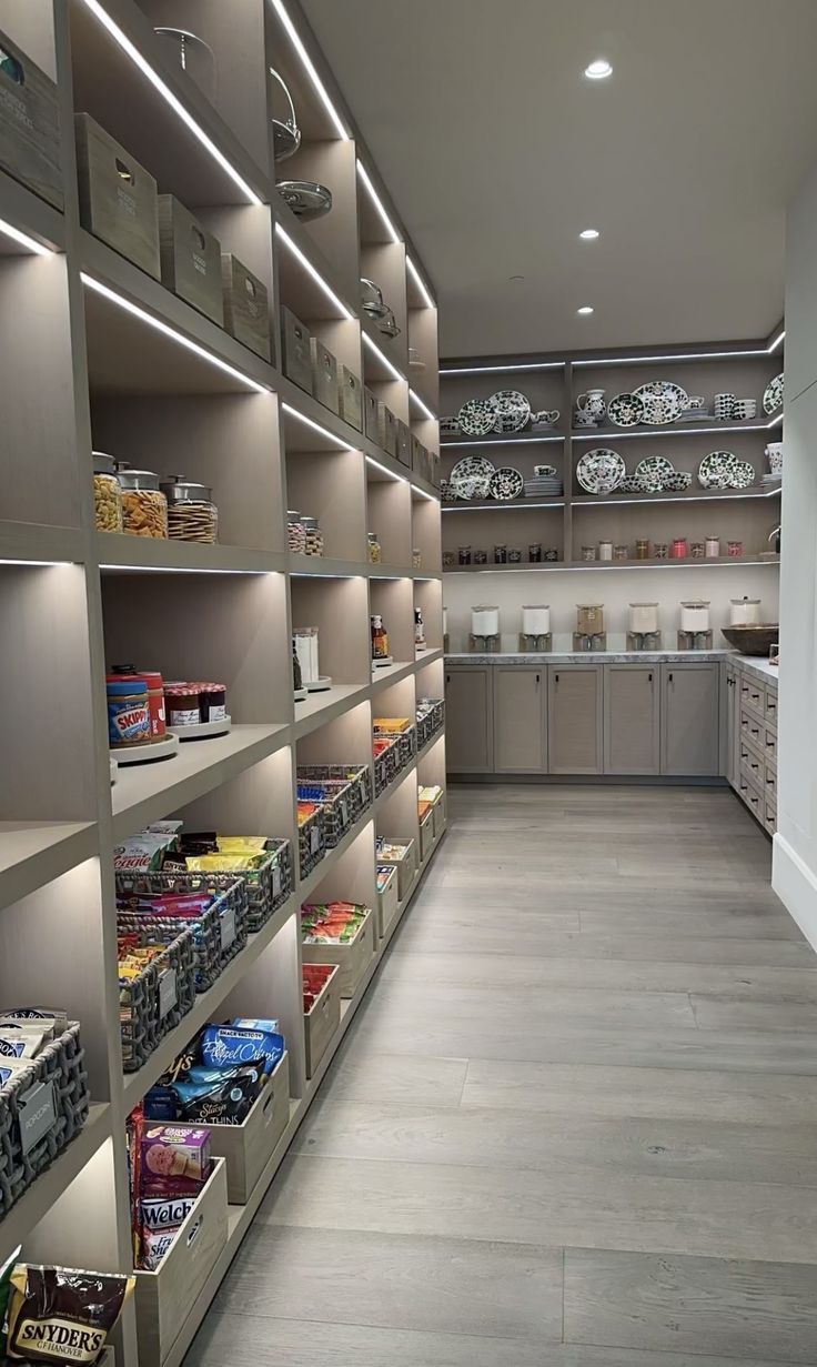 the shelves are full of food in the kitchen