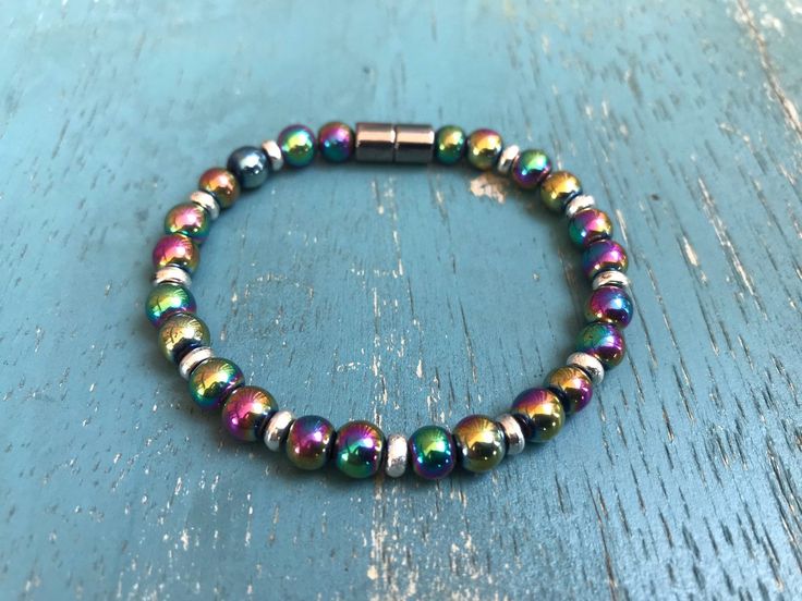 Magnetic rainbow beads and sterling silver plated magnetic accent beads held by the strongest magnetic clasp I can find! This is a pretty piece that works just as well to kick your inflammation to the curb. Please MEASURE with a string and add up to 1/2" to accommodate bead space! Bracelets are sized by length in a straight line. The bigger the bead, the more space it takes up inside the bracelet when it's clasped. Large beads require a longer length added than small beads. These are medium bead Space Bracelets, Sinus Pressure, Magnetic Necklace, Bracelet Rainbow, Poor Circulation, Large Beads, Insulin Pump, Magnetic Jewelry, Pensacola Fl