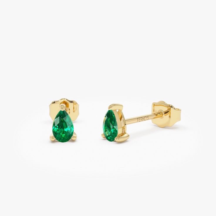 Experience sophistication with our Emerald Teardrop Studs, meticulously crafted from 14K solid gold. These pear-shaped emerald cut earrings exude minimalist elegance, perfect for celebrating the May birthstone or adding a touch of refinement to any ensemble. An ideal choice for a dainty birthday gift, these earrings radiate timeless charm and style. Features: * Made to Order * Gold Kt: 14K Solid Gold (also available in 18K) * Available Gold Colors: Yellow Gold, White Gold * Pear Shape Emerald: 2 Teardrop May Birthstone Earrings, Classic Teardrop May Birthstone Earrings, Classic Teardrop Earrings For May Birthstone, Yellow Gold Pear-shaped May Birthstone Earrings, 14k Gold Pear-shaped Teardrop Earrings Gift, 14k Gold Teardrop Pear-shaped Earrings, Classic Pear-shaped May Birthstone Earrings, Yellow Gold Pear-shaped Teardrop Earrings, Yellow Gold Pear Shaped Teardrop Earrings