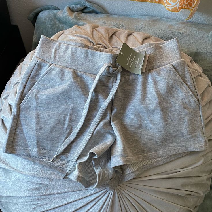 Brand New H&M Lounge Shorts In Heather Grey. Elastic/Stretchy Waistband. Very Cute Just Too Short For My Liking. Size: M. Last Photo Shown For Fit. *No Longer Sold In Grey* Casual Stretch Shorts For Relaxation, Fitted Shorts For Summer Relaxation, Casual Fitted Shorts For Relaxation, Fitted Casual Shorts For Relaxation, Casual Gray Shorts For Lounging, H&m Stretch Shorts For Summer, H&m Short Bottoms With Elastic Waistband, H&m Elastic Waistband Short Bottoms, Casual Fitted Shorts For Lounging