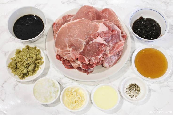 the ingredients are laid out on the table to make a meat dish in different bowls