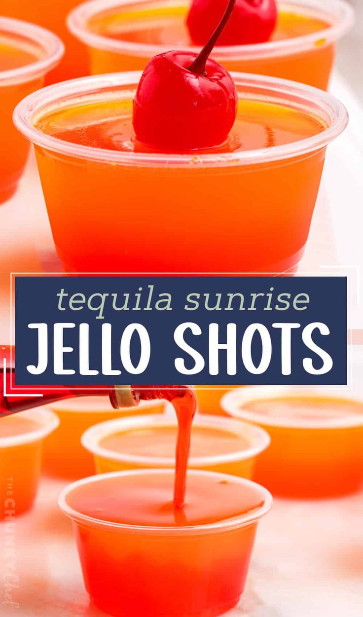 orange jello shots in plastic cups with a cherry on top and the words tequila sunrise jello shots