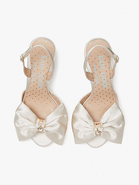 For the bride-to-be: Toss the bouquet in that magical white dress and these satin slingback pumps, done in a d'orsay style and adorned with pearls and jewels to boot. | Kate Spade Happily Slingback Pumps, Ivory Bridal Bride Heels, Old Hollywood Wedding, Ivory Shoes, Kate Spade Style, Timeless Shoes, Fairy Wedding, Ivory Bridal, Fancy Shoes, Kate Spade Shoes