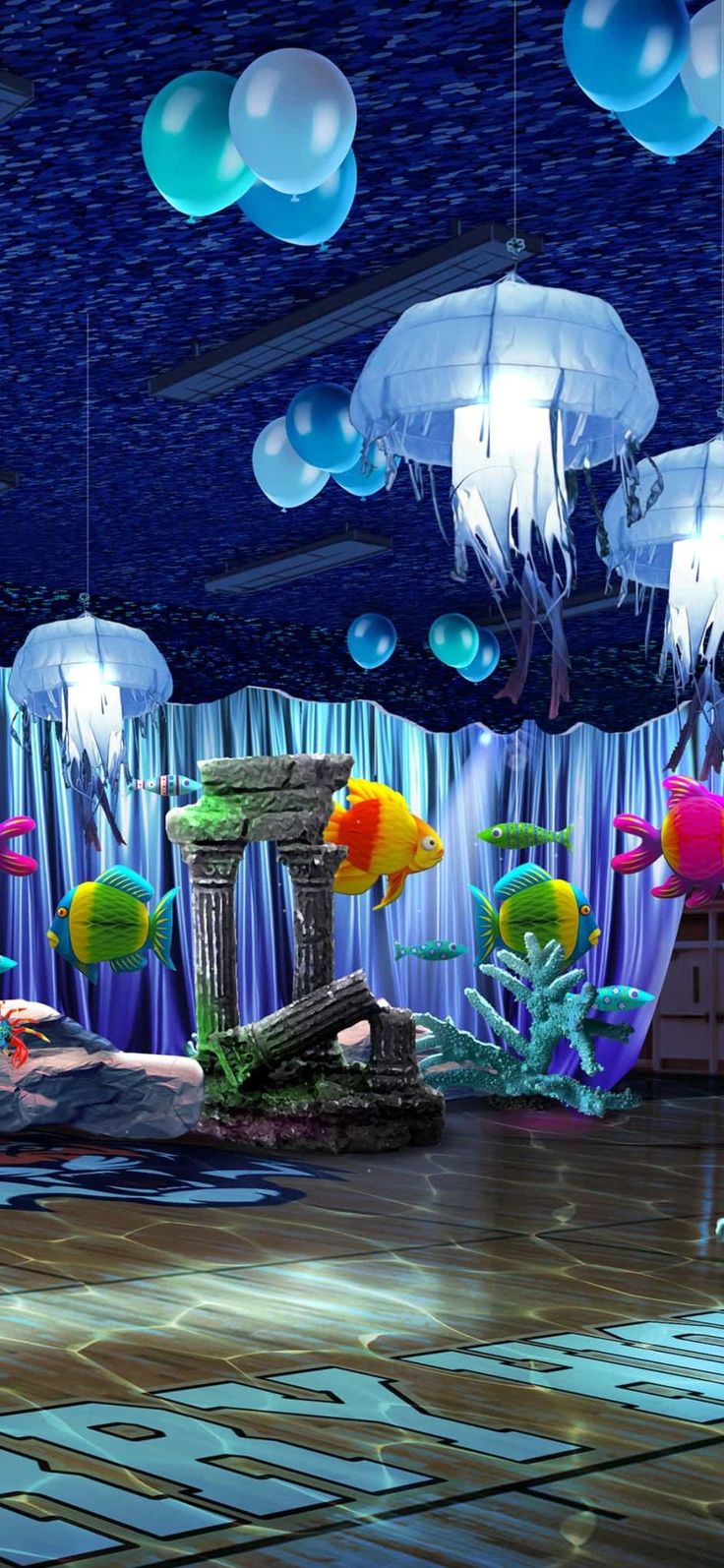 an underwater themed party with balloons and decorations