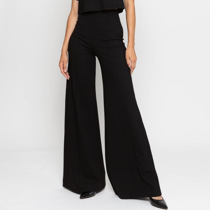 Black Ponte Knit Wide Leg Pant Modern Stretch Bottoms For Party, Modern Stretch Pants For Party, Modern Full Length Party Bottoms, Modern Full-length Pants For Night Out, Modern High Rise Stretch Pants, High Rise Wide Leg Pants For Night Out, Chic Wide Leg Pants With Stretch Waistband, Chic Stretch Wide Leg Pants With Wide Waistband, Chic Fitted Wide Leg Pants With Wide Waistband