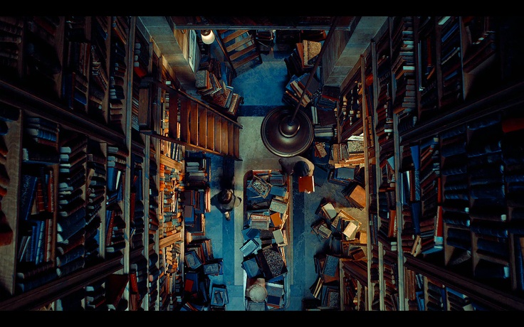 an overhead view of bookshelves in a library