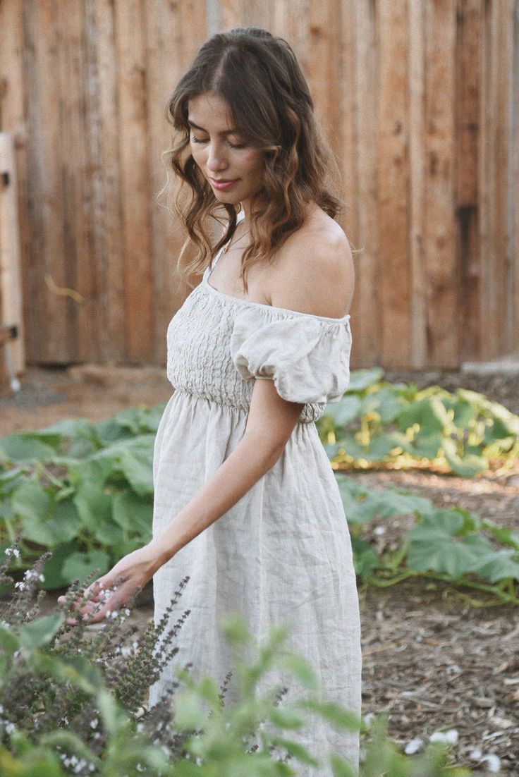 Style // A timeless oatmeal linen dress, our Moon shade is the perfect mix of sand and cream color Effortlessly romantic and oh so pretty, our Menorca Dress is a mid length linen dress designed to transition throughout the year. Pair with sandals for summer or boots for fall and winter. Made from super-soft linen, with puffed sleeves that can be worn the way you love best! Over the shoulder for an elegant square neck line or off-the-shoulder for a feminine touch Fabric Note // Made in Italy from Cottagecore Linen Dress For Garden Party, Beige Linen Dress For Summer Brunch, Beige Linen Summer Dress For Brunch, Cottagecore Fitted Linen Dress For Summer, Fitted Cream Linen Summer Dress, Beige Linen Dress For Spring Garden Party, Cream Linen Dress For Garden Party, Neutral Linen Summer Dress, Cream Linen Dress For Brunch