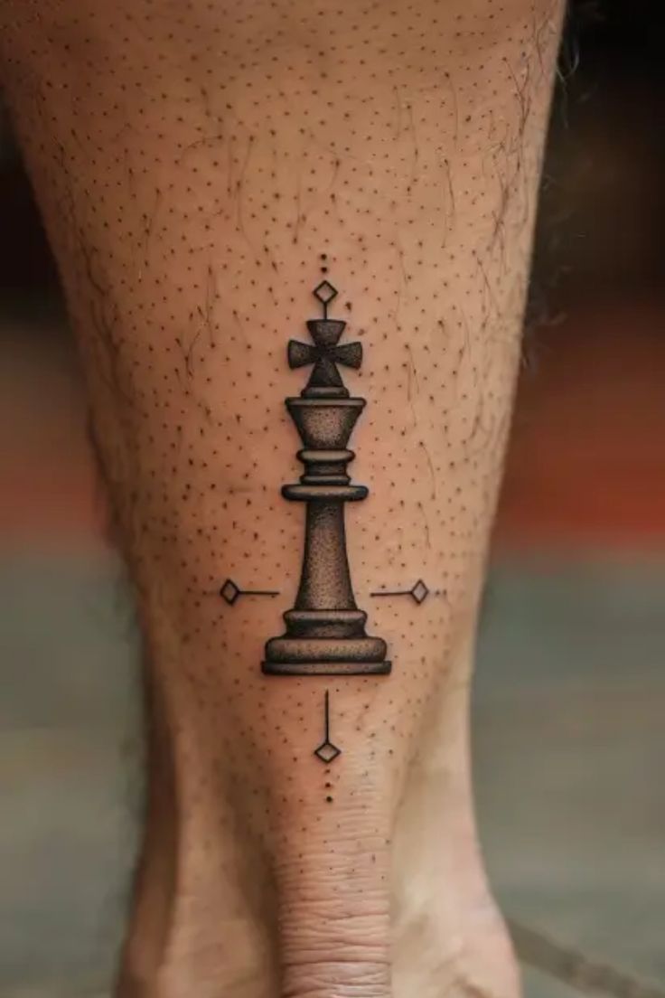 a person with a tattoo on their foot that has a chess piece on the side