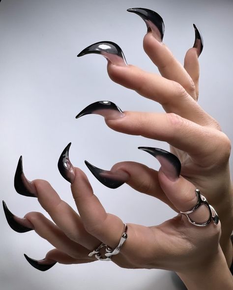 Cast a stylish spell with these witchcraft-inspired nails! 🖤✨ Featuring mystical symbols, moons, and enchanted details, these nails are perfect for those who embrace magic and mystery. 💅🌙 #WitchcraftNails #MysticalMani #WitchyVibes Black Nail Art Gothic, Xg Nails, Werewolf Nails, Witchcraft Nails, Black Gothic Nails, Cat Claw Nails, Desert Cowboy, Mystical Symbols, Inner Witch